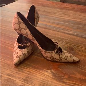 Authentic Gucci monogram heels, light wear